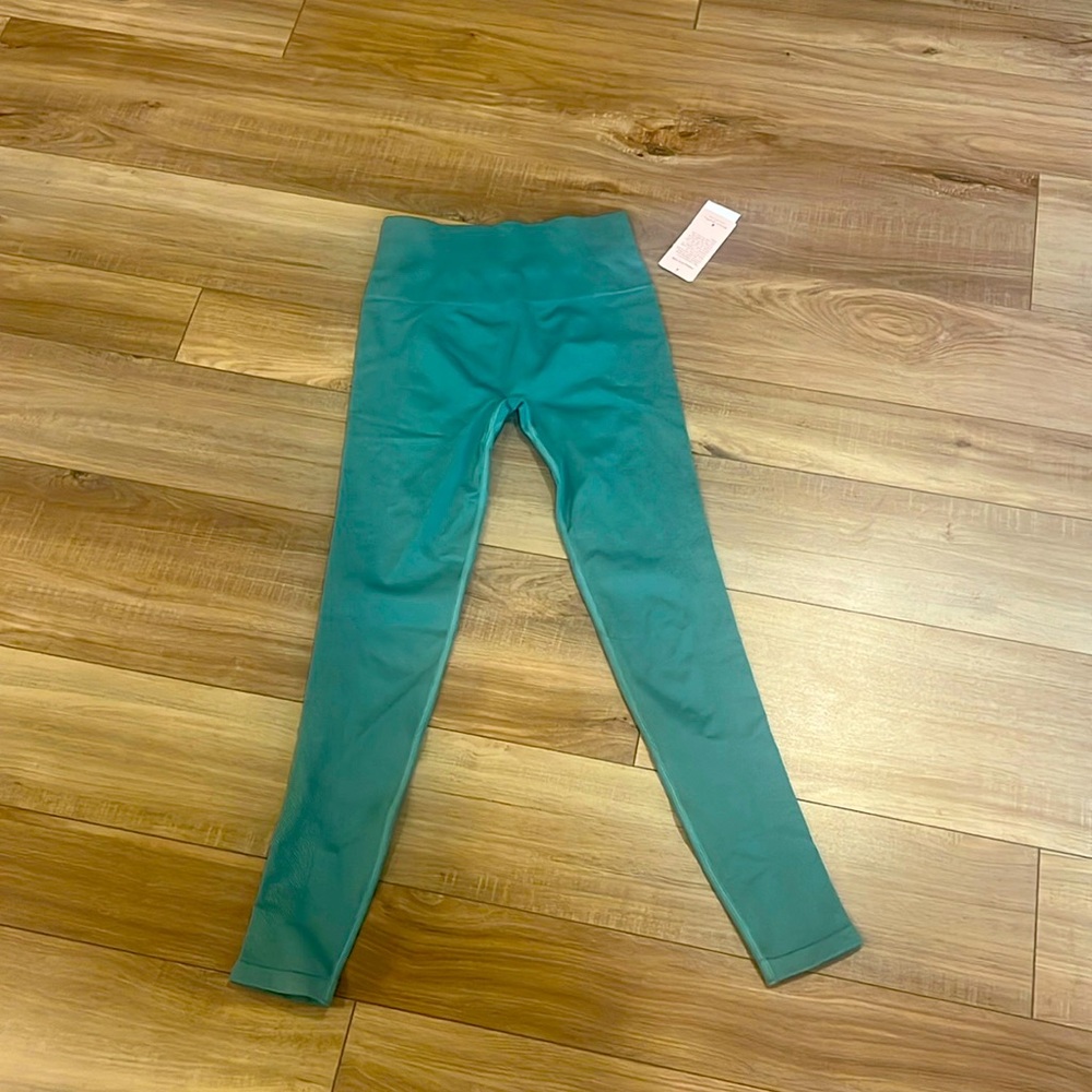 Spiritual gangster leggings. New with tag. Size small extra small.